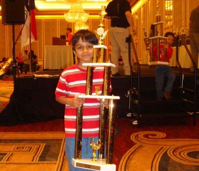 A young student enjoying an interactive online chess class